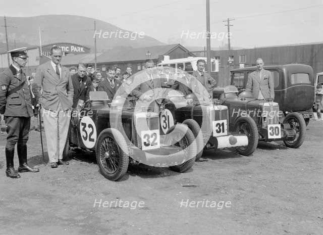 Three MG C type Midgets at the RAC TT Race, Ards Circuit, Belfast, 1932. Artist: Bill Brunell.