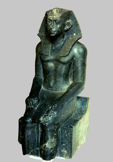 Seated statue of Sesostris III depicted as a young man, made in diorite, comes from Medamout, 187…