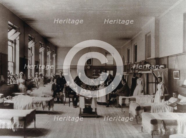 Baron Lister (seated) with his staff, Victoria ward, King's College Hospital, Lincoln's..., 1893. Creator: Unknown.