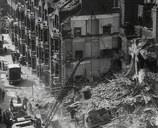 People Clearing Out Bomb Damage , 1942. Creator: British Pathe Ltd.