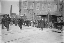 Strikers leave mills, Passaic, between c1910 and c1915. Creator: Bain News Service.