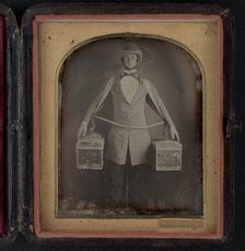 Occupational portrait of a peddler, full-length, standing, facing front..., between 1840 and 1860. Creator: Myers.