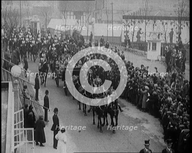 Crowds Stand by and Cheer as King George V and Queen Mary of The United Kingdom Ride in a..., 1924. Creator: British Pathe Ltd.