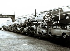 Group of engineers, engine drivers and members of the Company, with the train engine that made th…