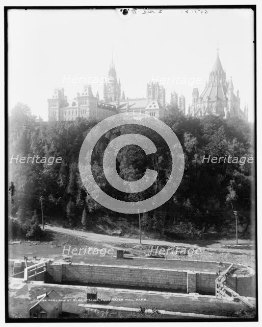 Parliament B'lg's, Ottawa, from Manor i.e. Major's Hill Park, between 1890 and 1901. Creator: Unknown.