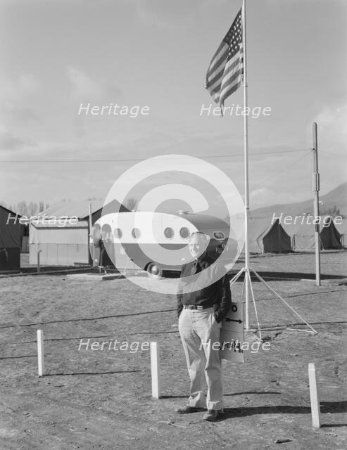 The camp manager at camp entrance, FSA, Merrill, Klamath County, Oregon, 1939. Creator: Dorothea Lange.