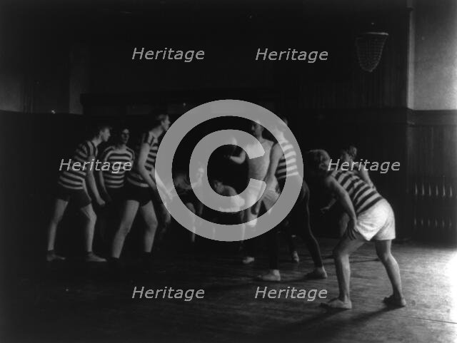Male students playing basketball, Western High School, Washington, D.C., (1899?). Creator: Frances Benjamin Johnston.