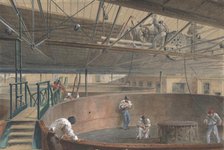 Coiling the Cable in the Large Tanks at the Works of the Telegraph Construction..., 1865, 1865. Creator: Robert Charles Dudley.