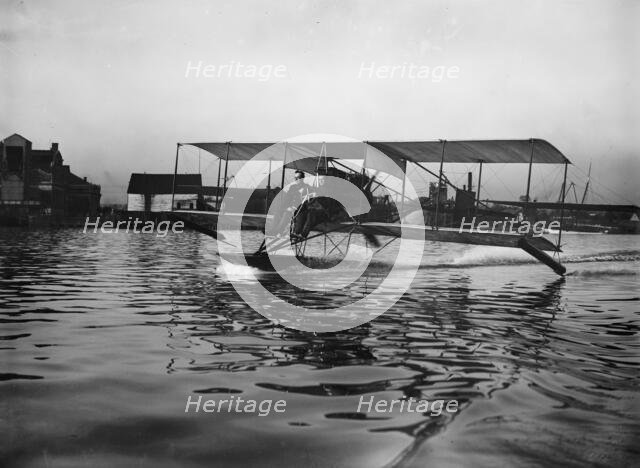 Lieutenant Theodore G. Ellyson, U.S.Navy, Testing Seaplane On Potomac, 1911. Creator: Harris & Ewing.