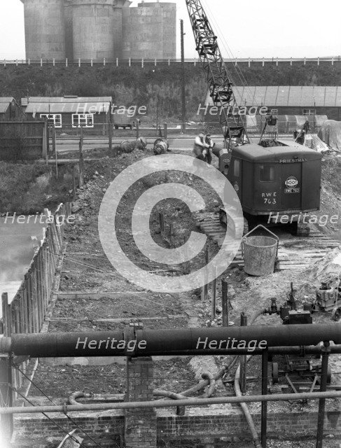 Construction of the reservoir, Manvers Main Colliery, Wath upon Dearne, South Yorkshire, 1955. Artist: Michael Walters