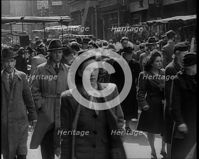 People Moving Along Crowded Streets, 1940. Creator: British Pathe Ltd.