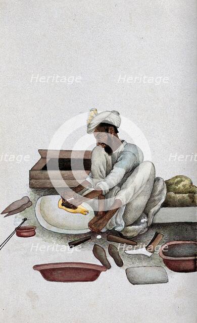 A shoemaker making slippers, (between 1800 and 1899?). Creator: Unknown.
