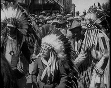 Field Marshal Douglas Haig, 1st Earl Haig, Wearing a Native American Headdress, 1921. Creator: British Pathe Ltd.