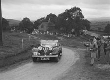 Jensen open 4-seater of Ken Crawford competing in the South Wales Auto Club Welsh Rally, 1937 Artist: Bill Brunell.