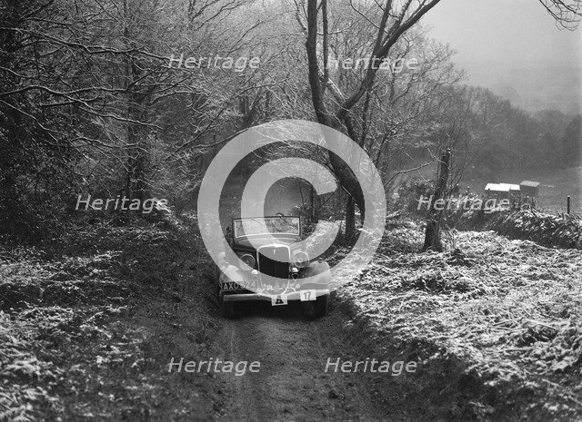 1934 Ford V8 tourer taking part in a motoring trial, late 1930s. Artist: Bill Brunell.