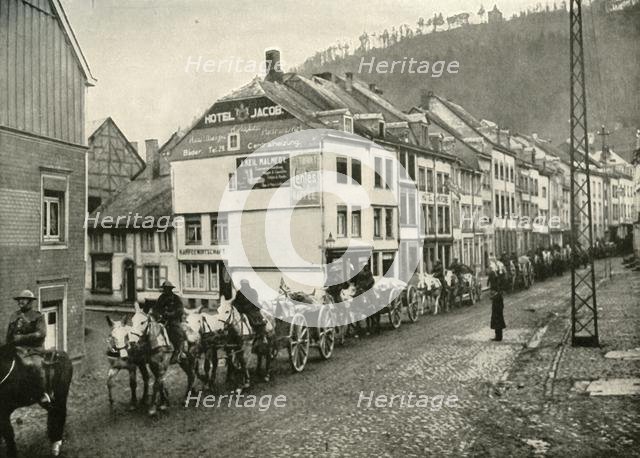 'Our Transport Passing Through Malmedy, the First German Town Over the Frontier', (1919).  Creator: Unknown.