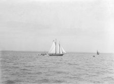 The 21-ton schooner 'Diablesse' leaving Cowes for America, 1922.  Creator: Kirk & Sons of Cowes.