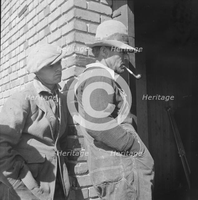 Warehouse used as distributing office for FSA relief grants, Bakersfield, California, 1938. Creator: Dorothea Lange.