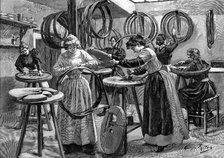 Women making pneumatic tyres for bicycles, France, 1896. Artist: Unknown