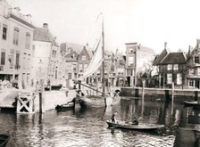 Canal yard, Dordrecht, Netherlands, 1898.Artist: James Batkin
