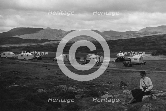 Group of cars and caravans camping in Scottish Highlands 1930's. Creator: Unknown.