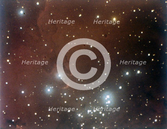 Nebulosity and star cluster in Serpens. Creator: NASA.