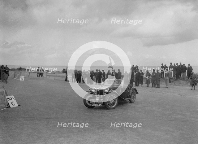 MG PA of Miss E Violet Watson competing in the RSAC Scottish Rally, 1934. Artist: Bill Brunell.