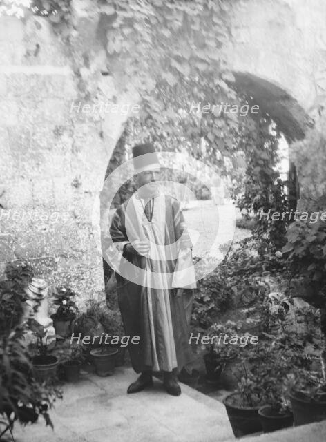 Benetti, Franco, Mr., standing outdoors, 1929 Creator: Arnold Genthe.