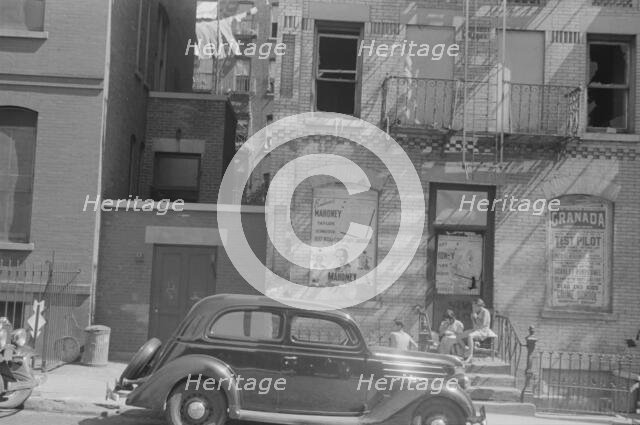 House fronts, 61st Street between 1st and 3rd Avenues, New York, 1938. Creator: Walker Evans.