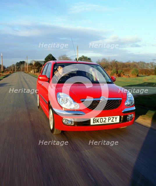 2002 Daihatsu Sirion 1.3 SL. Artist: Unknown.