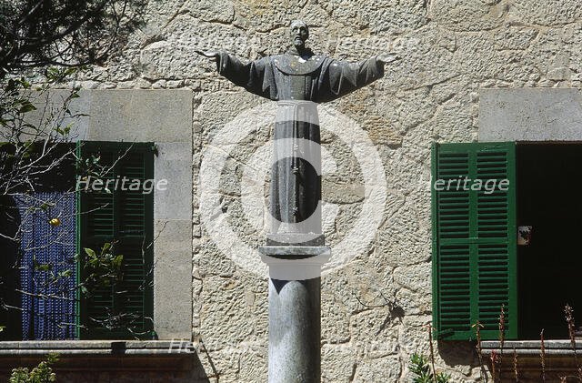 Statue of Saint Francis of Assisi, Garden of The Sanctuary of Cura de Randa, Majorca, Spain, (2001). Creator: LTL.