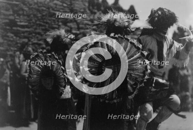 Buffalo dancers, c1905. Creator: Edward Sheriff Curtis.