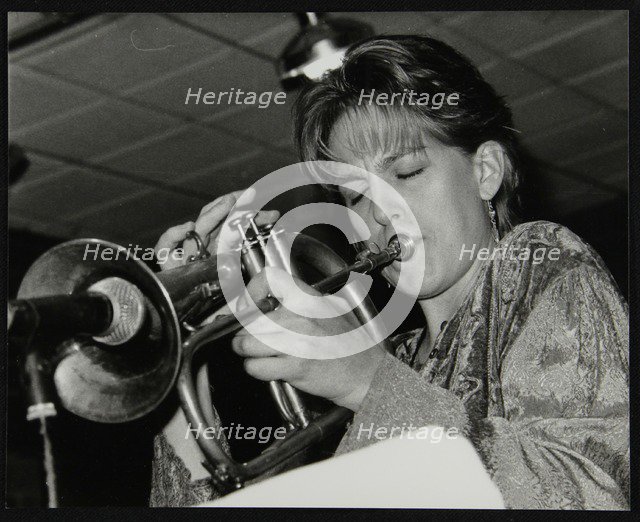 Ingrid Jensen playing the flugelhorn at The Fairway, Welwyn Garden City, Hertfordshire, 1997. Artist: Denis Williams