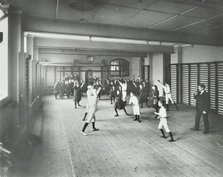 Boys and girls playing netball, Cable Street School, Stepney, London, 1908. Artist: Unknown.