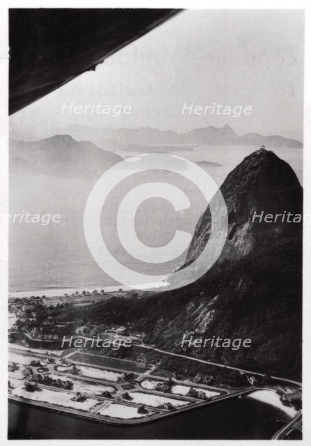 Aerial view of Sugarloaf Mountain, Rio de Janeiro, Brazil, from a Zeppelin, 1930 (1933). Artist: Unknown