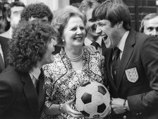 Margaret Thatcher enjoys a joke with Kevin Keegan and Emlyn Hughes, 6th June 1980. Artist: Unknown