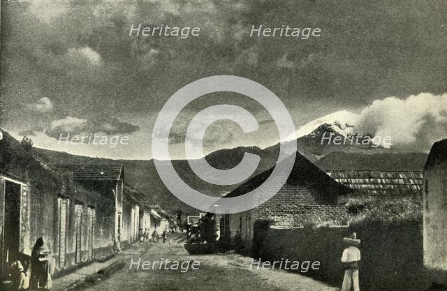 'Typical Side Street in Mexican Village: The Town of Ameca and Cloud-Effect on Popocatepetl', 1919. Creator: Unknown.
