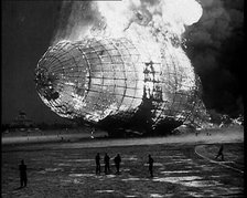 The German Airship, the Hindenburg, its Rear Half Destroyed And Obscured By Smoke With..., 1937. Creator: British Pathe Ltd.