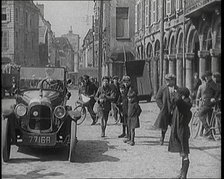 Male British Civilian Driving a Car Executing a Turning Manoeuvre On the Streets of London..., 1920s Creator: British Pathe Ltd.