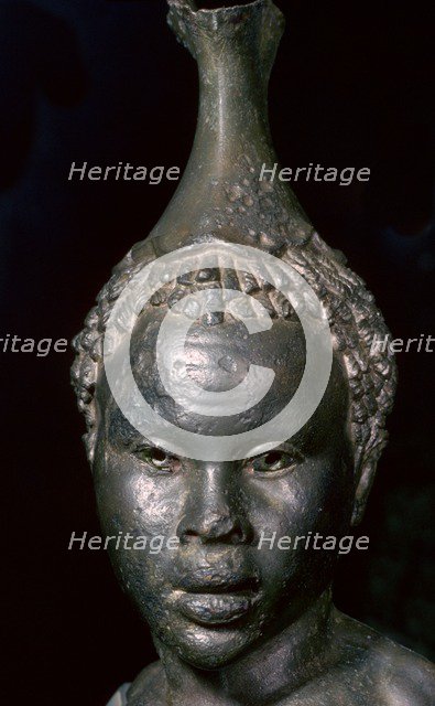 Bronze vessel in the form of the head of a young African woman. Artist: Unknown