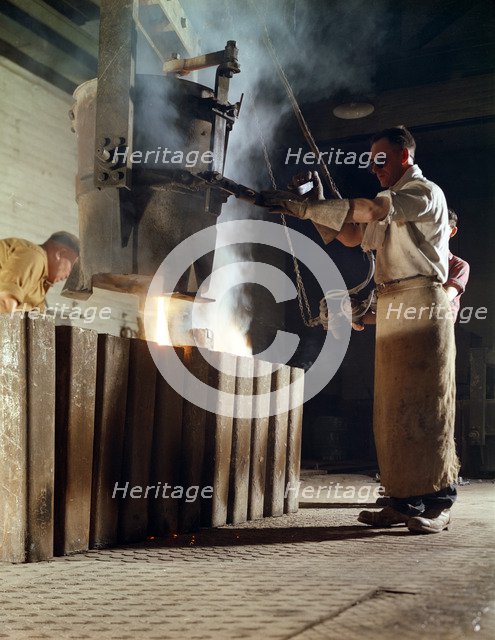 Teeming iron into ingots, J Beardshaw & Sons, Sheffield, South Yorkshire, 1963.  Artist: Michael Walters
