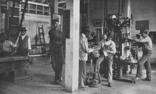 In the machine-shop, 1904. Creator: Frances Benjamin Johnston.
