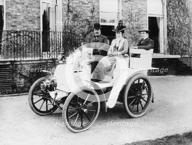Frank Butler and daughter on a 6hp Panhard, 1900. Artist: Unknown