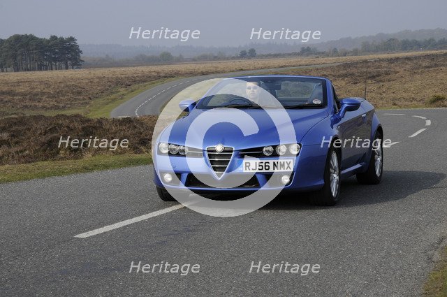 2006 Alfa Romeo Spyder driving in New Forest. Artist: Unknown.
