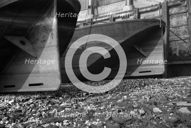 The stern boards of Thames barges, 1937. Artist: SW Rawlings