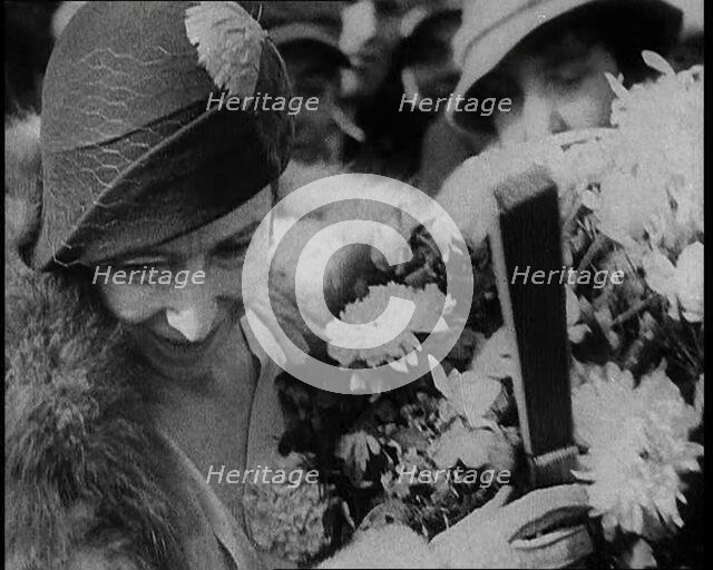 Elizabeth, Her Majesty the Queen of the Belgians Receiving Flowers, 1930s. Creator: British Pathe Ltd.