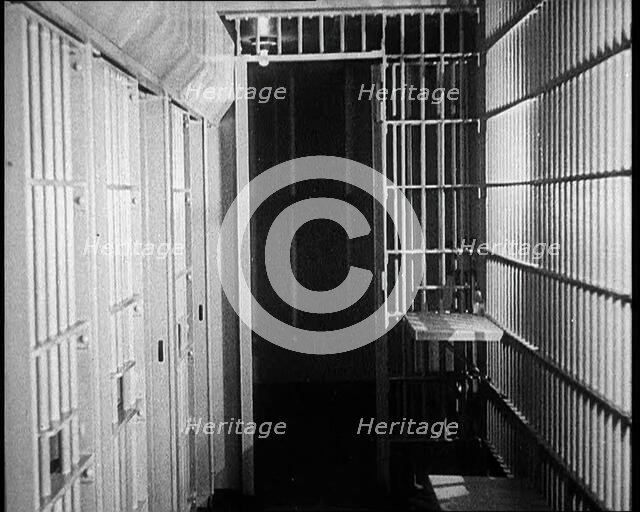 Inside of an American Prison, Corridor and Cells, 1930s. Creator: British Pathe Ltd.