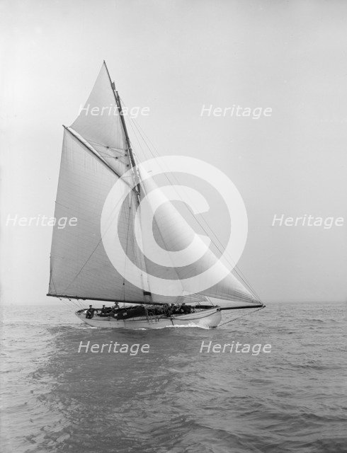 The cutter 'Grisette' sailing close-hauled, 1913. Creator: Kirk & Sons of Cowes.