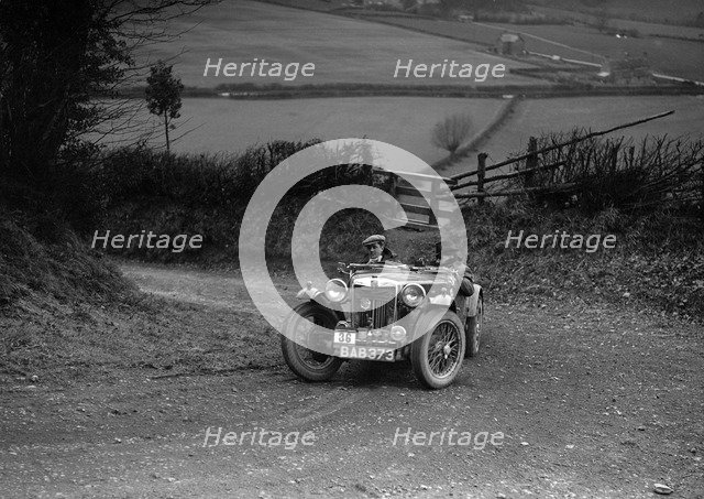 MG TA of NH Grove competing in the MG Car Club Midland Centre Trial, 1938. Artist: Bill Brunell.