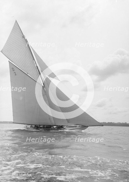 The 15 Metre cutter 'Ostara' sailing close-hauled, 1912. Creator: Kirk & Sons of Cowes.